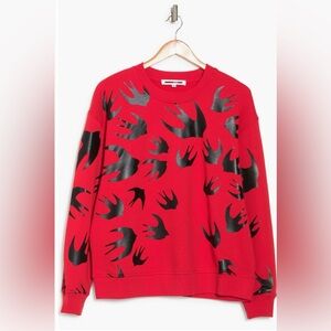 McQ by Alexander McQueen Red Crewneck Sweater with Black Swallow Motif